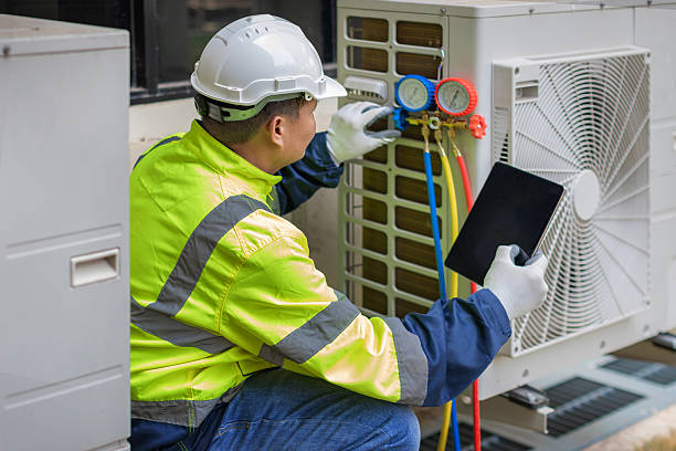 Professional Air Conditioning Repair technician working in Ballston Lake, NY